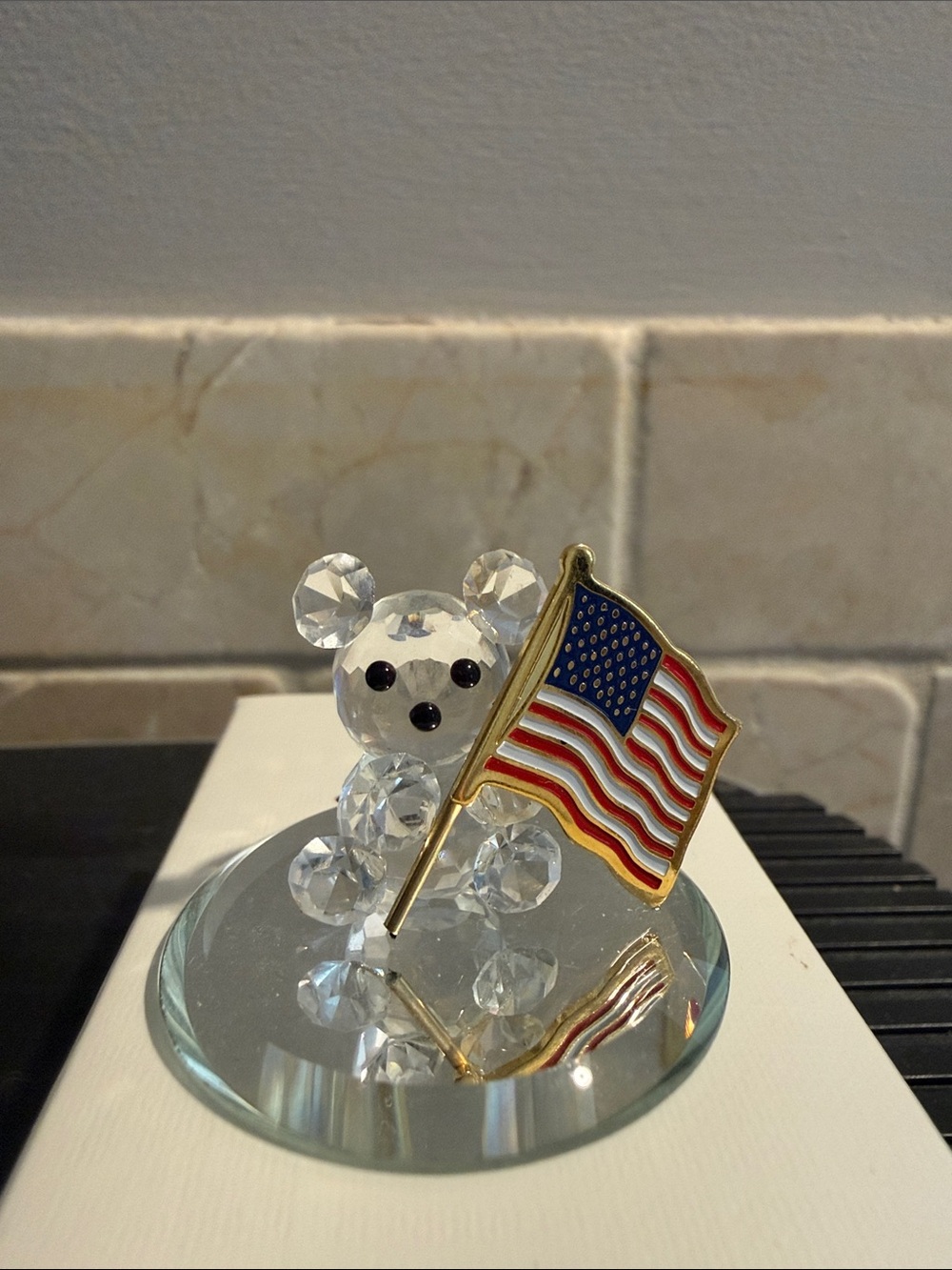 Swarovski Clear Crystal Bear Figurine with Gold and Red-White-Blue Flag Accent